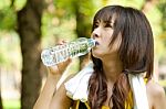 Asian Girl Drinking Water Stock Photo