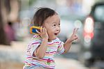 Asian Girl With Cute Action Stock Photo