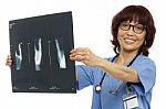 Asian Surgeon Showing Xray Report Stock Photo