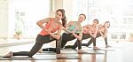 Asian Woman Doing Yoga Indoors Stock Photo