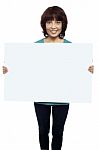 Asian Woman Holding Blank Board Stock Photo