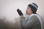 Asian Woman In Fog Stock Photo