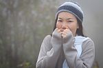 Asian Woman In Fog Stock Photo