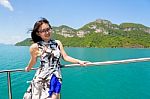 Asian Woman On The Boat Stock Photo