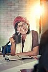 Asian Woman Toothy Smiling Face With Happiness Emotion Discussion In Cofee Shop ,relaxing Emotion ,modern Lifestyle Of People Stock Photo