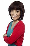 Asian Woman With Arms Crossed Stock Photo