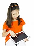 Asian Young Girl Is Holding Tablet Stock Photo