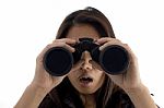 Astonished Female Watching Through Binocular Stock Photo