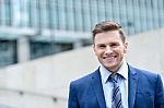 Attractive Businessman Standing At Outdoors Stock Photo