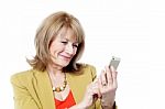 Attractive Businesswoman Using A Smartphone Stock Photo