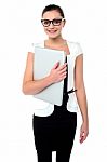 Attractive Businesswoman With A Folder Stock Photo