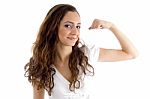 Attractive Female Showing Muscles Stock Photo