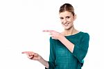 Attractive Girl Pointing Towards Copy Space Area Stock Photo