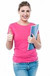 Attractive Girl Showing Thumbs Up Stock Photo