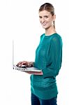 Attractive Girl Working On Laptop Stock Photo