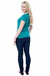 Attractive Smiling Lady Turning Back Stock Photo