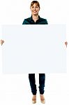 Attractive Woman Holding Blank Ad Board Stock Photo