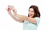 Attractive Woman Is Taking Photos With Cell Phone Stock Photo