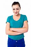 Attractive Young Woman With Folded Arms Stock Photo