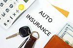 Auto Insurance With Car Key And Money Stock Photo