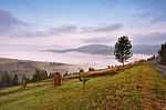 Autumn September Foggy Morning In Mountains Stock Photo