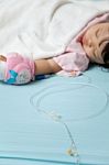 Baby Have Diarrhea And Sleep On A Bed In Hospital With Saline In Stock Photo