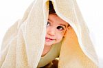 Baby Looking Out From Under His Blanket Stock Photo