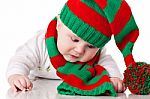 Baby With Christmas Hat And Scarf Stock Photo