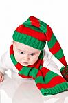 Baby With Christmas Hat And Scarf Stock Photo