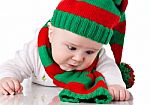 Baby With Christmas Hat And Scarf Stock Photo