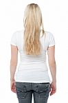 Back Pose Of A Young Woman In Casuals Stock Photo