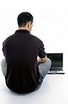 Back Pose Of Male With Notebook Stock Photo