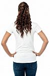 Back Pose Of Stylish Young Woman Stock Photo