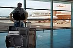 Backpack Passenger In The Airport Terminal Stock Photo