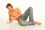 Bare Chested Man With Headphones Stock Photo