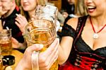 Bavarian Girls Drinking Beer Stock Photo