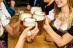 Bavarian Girls Drinking Beer Stock Photo