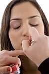 Beautician Doing Lip Make Up Of Woman Stock Photo