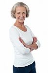 Beautiful Aged Woman With Crossed Arms Stock Photo