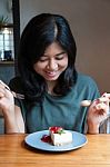 Beautiful Asian Woman Prepare To Eating A Cake In Cafe Stock Photo