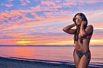 Beautiful Black African American Woman Posing On The Beach At Su Stock Photo