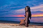 Beautiful Black African American Woman Posing On The Beach At Su Stock Photo