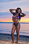 Beautiful Black African American Woman Posing On The Beach At Su Stock Photo