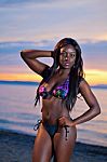 Beautiful Black African American Woman Posing On The Beach At Su Stock Photo