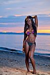 Beautiful Black African American Woman Posing On The Beach At Su Stock Photo