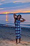 Beautiful Black African American Woman Posing On The Beach At Su Stock Photo