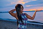 Beautiful Black African American Woman Posing On The Beach At Su Stock Photo