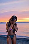 Beautiful Black African American Woman Posing On The Beach At Su Stock Photo