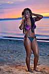 Beautiful Black African American Woman Posing On The Beach At Su Stock Photo