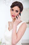 Beautiful Bride And Mobile Phone Stock Photo